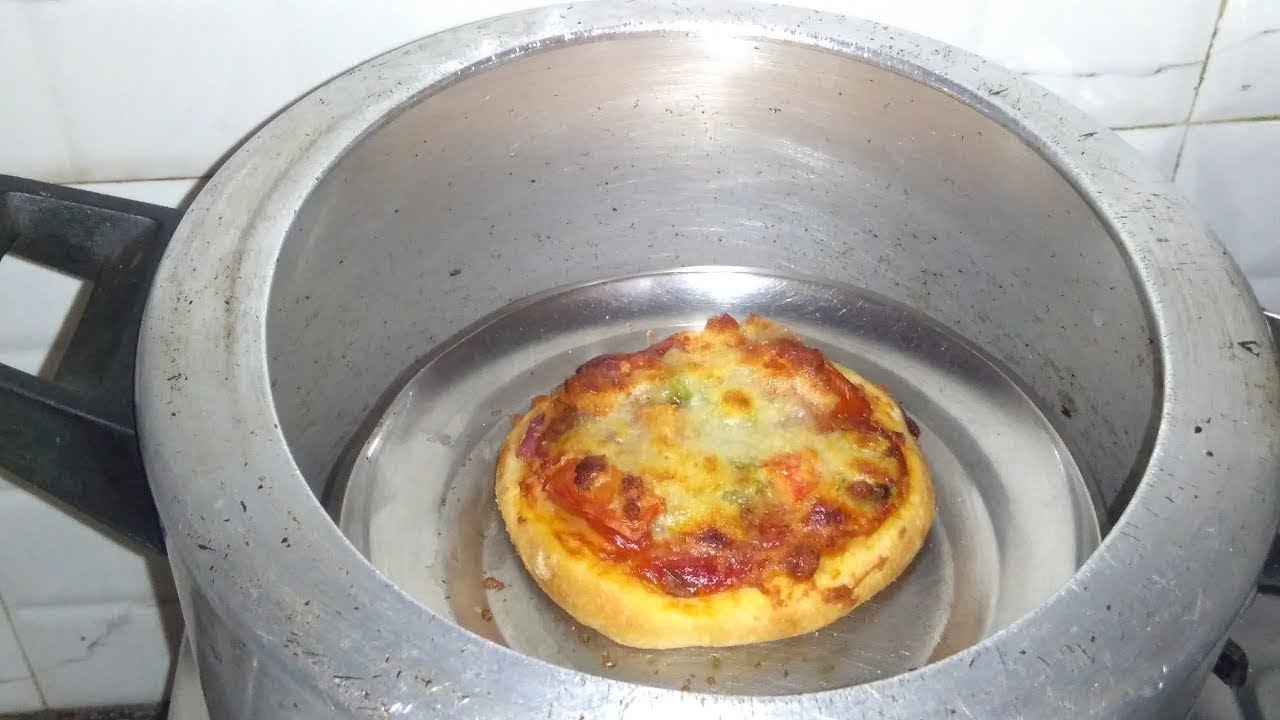 Photo of अब घर में आसानी से बनाये ‘कुकर पिज्जा’ रेसिपी