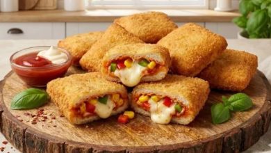 Photo of बिना ओवन और मैदा के घर पर इस आसान रेसिपी से बनाएं बाजार जैसा चीजी ब्रेड पिज्जा पॉकेट